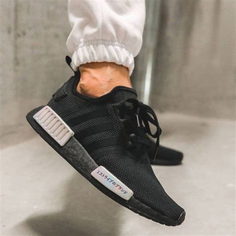 adidas nmd aanbieding|Adidas NMD with japanese writing.